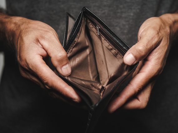 Person with empty wallet as cost of living expense increase